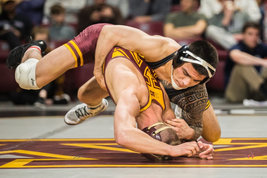 Iowa's 149-lb Pat Lugo wrestles Minnesota's Thomas Thorn during the third session of the 2019 Big Ten Wrestling Championships in Minneapolis, MN on Sunday, March 10, 2019. Lugo won by decision, 6-4.