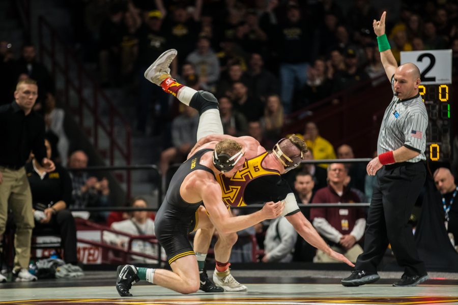 Iowas 157-lb  Kaleb Young wrestles Minnesotas Steve Bleise during the third session of the 2019 Big Ten Wrestling Championships in Minneapolis, MN on Sunday, March 10, 2019. Young won by decision, 4-1.