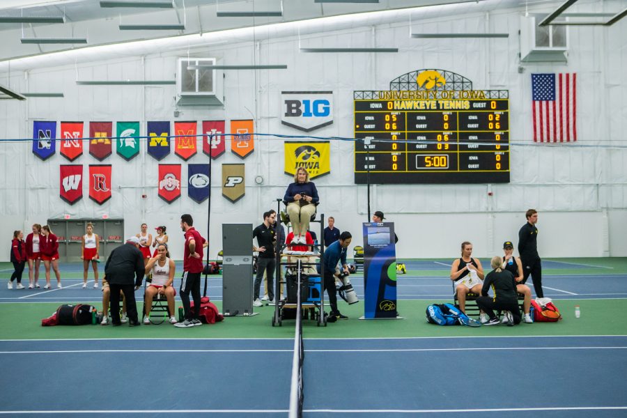 Players rest during a changeover during a womens tennis match between Iowa and Indiana at the HTRC on Sunday, March 31, 2019. The Hawkeyes defeated the Hoosiers, 4-3.