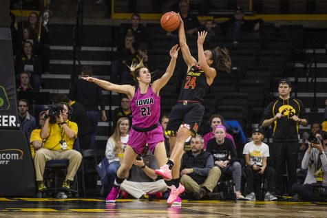 Iowa forward Hannah Stewart (21) guards Maryland forward Stephanie Jones (24) during the womens basketball game vs. Maryland at Carver-Hawkeye Arena on Sunday, February 17, 2019. The Hawkeyes defeated the Terrapins 86-73. 