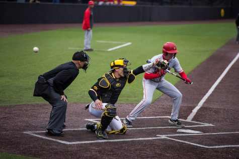 Iowas Austin Martin misses a pitch during a baseball game against Illinois State on Wednesday, Apr. 3, 2019. The Hawkeyes lost to the Redbirds 11-6. (Roman Slabach/The Daily Iowan)