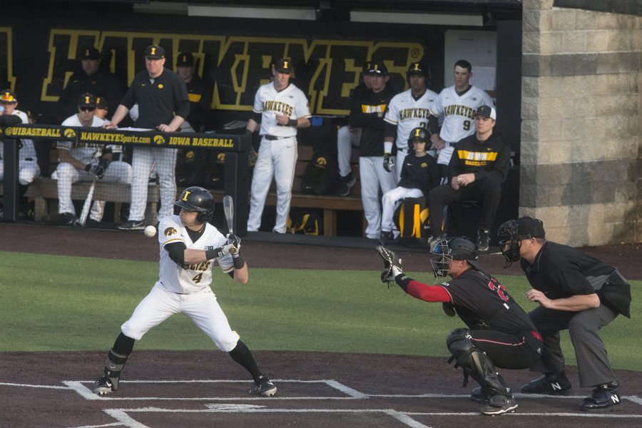 Iowa infielder Mitchell Boe lets a ball fly past at the Iowa vs Rutgers game at Duane Banks Field on Friday, April 4, 2019. Boe scored one run for the Hawkeyes in the bottom of the sixth. The Hawkeyes defeated the Scarlet Knights 6-1.