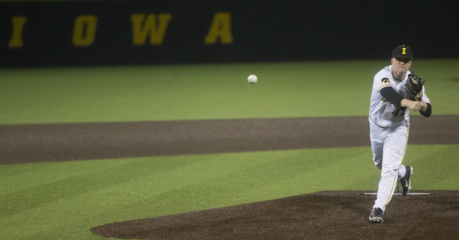 Iowa pitcher Trace Hoffman throws a pitch at the Iowa vs Rutgers game at Duane Banks Field on Friday, April 4, 2019. The Hawkeyes defeated the Scarlet Knights 6-1.