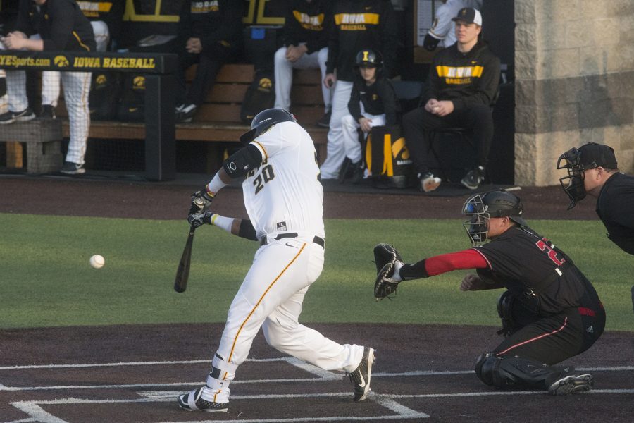 Iowa first baseman Izaya Fullard swings at a pitch at the Iowa vs Rutgers game at Duane Banks Field on Friday, April 4, 2019. Fullard flied out in the bottom of the fourth but came back with a home run in the bottom of the sixth. The Hawkeyes defeated the Scarlet Knights 6-1.