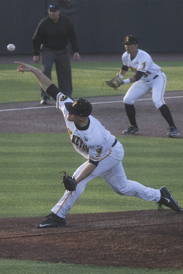 Iowa pitcher Cole McDonald throws a pitch at the Iowa vs Rutgers game at Duane Banks Field on Friday, April 4, 2019. The Hawkeyes defeated the Scarlet Knights 6-1.