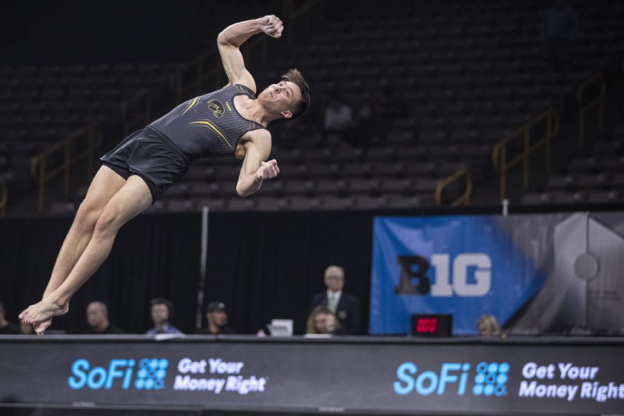 Hawkeye Gymnast Kulani Taylor competes in the floor exercise Friday in Carver Hawkeye Arena during the Mens Big Ten Championships. Penn State won the team competition with a combined score of 410.350 points. 
