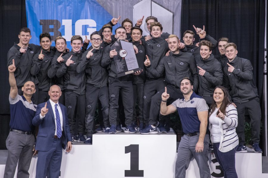 The Penn State men's gymnastics team poses for a picture  Friday in Carver Hawkeye Arena during the Men's Big Ten Championships. Penn State won the team competition with a combined score of 410.350 points. 