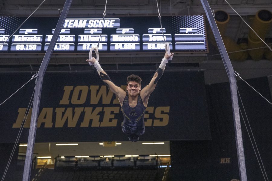 Hawkeye gymnast Evan Davis competes in still rings Friday in Carver Hawkeye Arena during the Men's Big Ten Championships. Penn State won the team competition with a combined score of 410.350 points. 