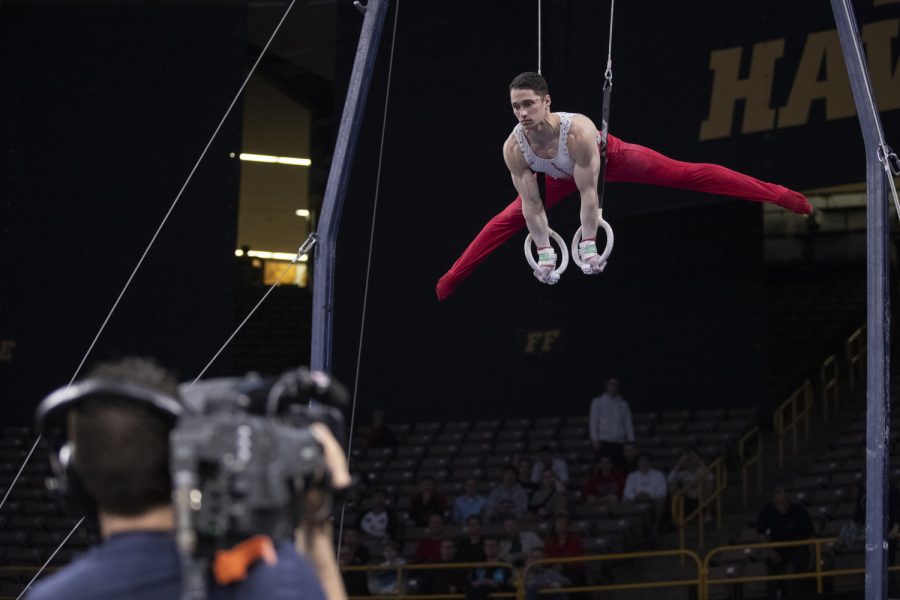 Nebraska gymnast Evan Hymanson competes in the still rings Friday in Carver Hawkeye Arena during the Men's Big Ten Championships. Penn State won the team competition with a combined score of 410.350 points. 