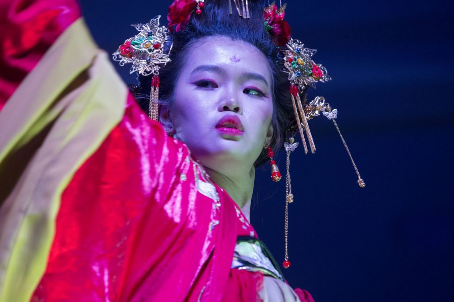 A University of Iowa student represents East Asia during the Walk It Out Fashion Show at the IMU Main Lounge on Saturday, April 6, 2019. 