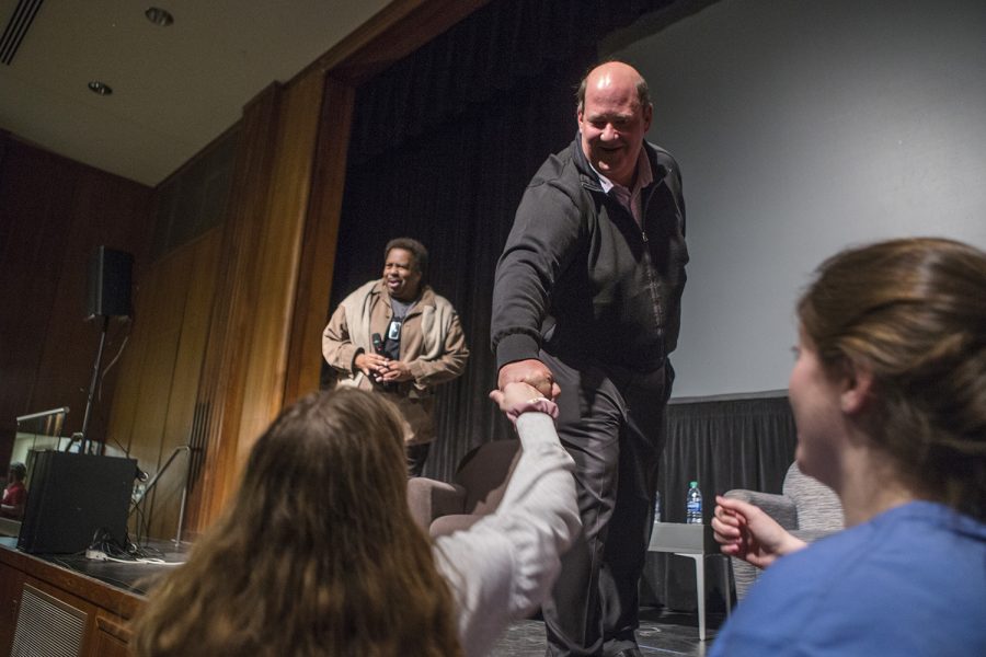 Comedian Brian Baumgarter (Kevin), from The Office, gives a fist-bump to an audience member at the IMU on Thursday, April 11, 2019. Baumgarter and Leslie David Baker (Stanley) shared anecdotes about their time on set and life following the shows end. 