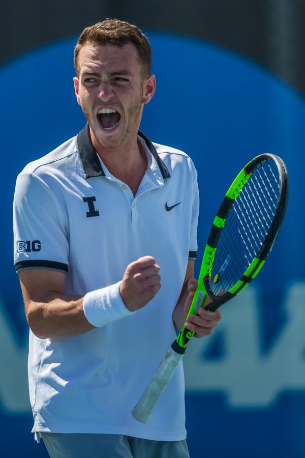 Iowa's Kareem Allaf celebrates a point during a men's tennis match between Iowa and Michigan at the HTRC on Sunday, April 21, 2019. The Hawkeyes, celebrating senior day, defeated the Wolverines, 4-1.