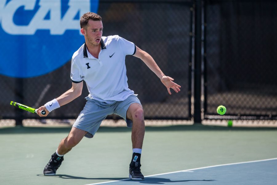 Iowa's Kareem Allaf hits a forehand during a men's tennis match between Iowa and Michigan at the HTRC on Sunday, April 21, 2019. The Hawkeyes, celebrating senior day, defeated the Wolverines, 4-1.