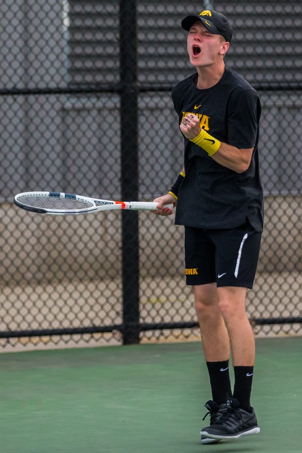 Iowa's Jason Kerst celebrates a point during a men's tennis match between Iowa and Illinois State at the HTRC on Sunday, April 21, 2019. The Hawkeyes defeated the Redbirds, 6-1.