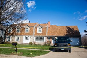 Police investigators investigate the scene on Sunday, April 7, 2019, at 114 Green Mountain Drive in Iowa City, Iowa.