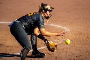 Iowa utility player Sarah Lehman catches a ground ball during the game against Nebraska at the Bob Pearl Softball Field on Wednesday, April 24, 2019. 