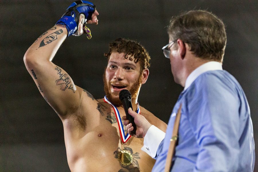 MMA fighter Darion Abbey celebrates after defeating Cornelius Chapman during Elite Fight League no. 4 at the Teamsters Union Hall in Cedar Rapids on Saturday, Apr. 13, 2019. Abbey won at 1:18 in the first round via tap due to strikes. 