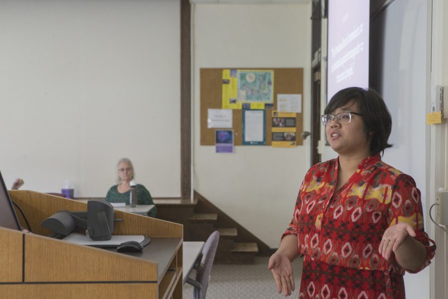 AJ King, President of the UI Trans Alliance, delivers a presentation called Crash Course: Transphobia at a brown bag event for Trans Week of Action in North Hall on Wednesday, April 24, 2019. (Jenna Galligan/The Daily Iowan)