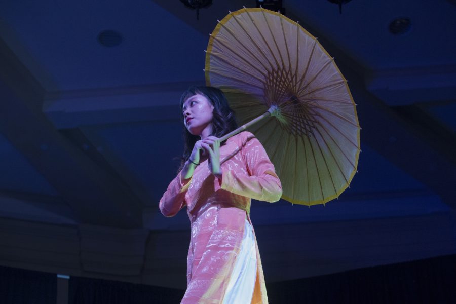 A University of Iowa student represents Southeast Asia during the Walk It Out Fashion Show at the IMU Main Lounge on Saturday, April 6, 2019. (Jenna Galligan/The Daily Iowan)