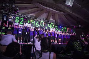 Dancers celebrate reaching $2,960,403.25 during Dance Marathon 25 at the Iowa Memorial Union on Saturday, February 2, 2019.