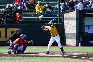 Iowas Chris Whelan stands in the batters box during a baseball game against the University of Illinois on Sunday, Mar. 31, 2019. The Hawkeyes defeated the Illini 3-1.