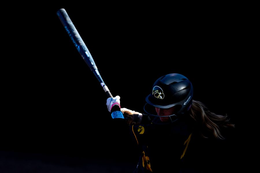 Iowa utility player Ashley Hamilton misses the ball during the game against Nebraska at the Bob Pearl Softball Field on Wednesday, April 24, 2019. The Hawkeyes were defeated 7-5 by the Huskers.