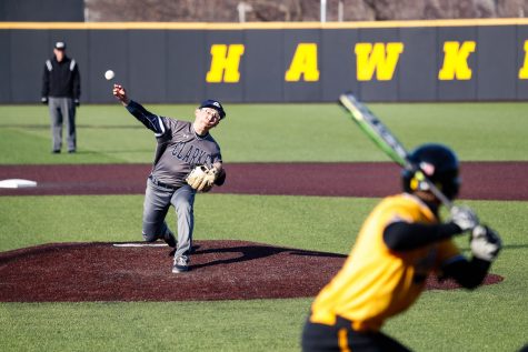 Clarke pitcher Tsubasa Maruyama pitches the ball to Iowas Brendan Sher during a baseball game against the University of Iowa on Sunday, Mar. 31, 2019. The Hawkeyes defeated the Pride 3-2. 