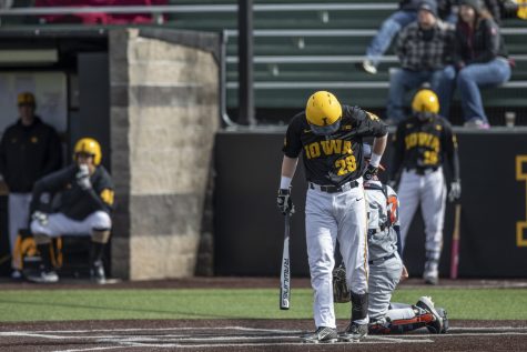 Hawkeye batter Chris Whelan prepares to bat during the baseball game against Illinois at Duane Banks Field on March 30, 2019. The Hawkeyes defeated the Fighting Illini 2-1 after the 9th inning.(Ryan Adams/The Daily Iowan)