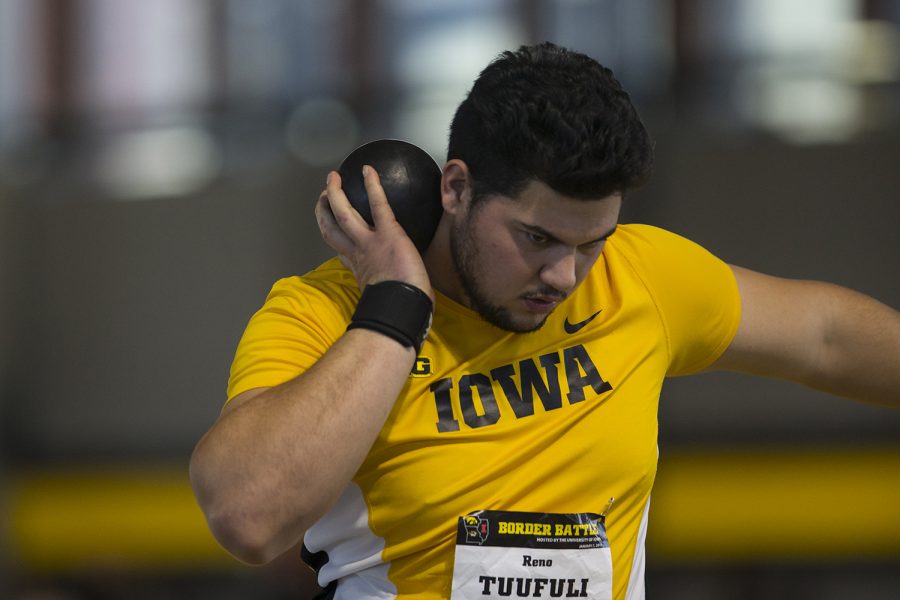 Iowa+sophomore+Reno+Tuufuli+attempts+a+throw+during+the+Border+Battle+indoor+track+meet+in+the+UI+Recreation+Building+with+Iowa%2C+Missouri+and+Illinois+competing+on+Saturday%2C+Jan.+7%2C+2017.+The+Hawkeye+women+defeated+Missouri+and+Illinois%2C+105-33+and+96-51+respectively%2C+while+the+men+defeated+Missouri%2C+107-27+and+fell+to+Illinois%2C+85-74.+