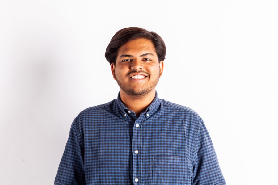 DI Staffer Aadit Tambe poses for a portrait on Monday, April 8, 2019. 