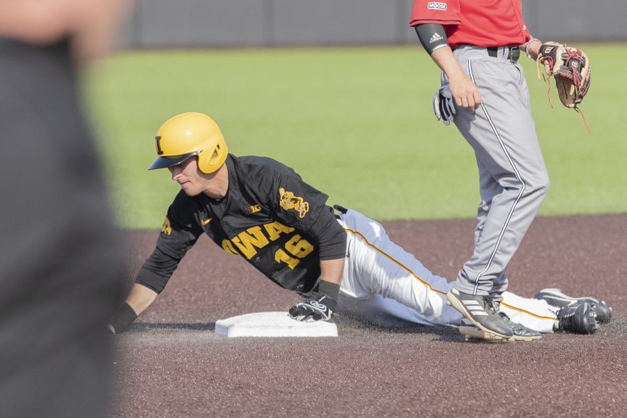 Iowa fielder Tanner Wetrich steals second during the bottom of the seventh in afternoon Iowa vs Rutgers game at Duane Banks Field on Saturday, April 7, 2019. The Hawkeyes defeated the Scarlet Knights 9-5. 