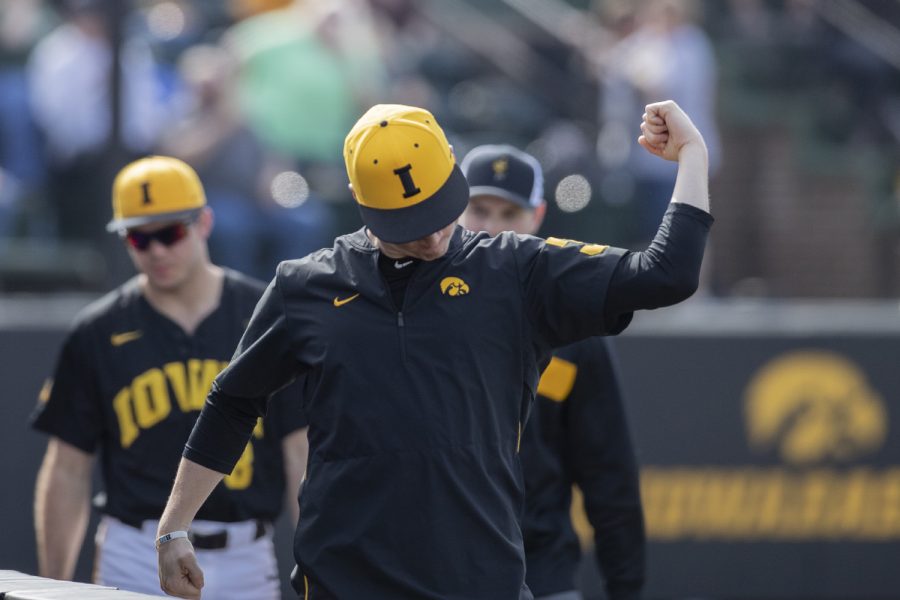 Iowa pitcher Jack Dreyer dances on the way back to his seat during the afternoon Iowa vs Rutgers game at Duane Banks Field on Saturday, April 7, 2019. Dreyer did not pitch this game. The Hawkeyes defeated the Scarlet Knights 9-5. 