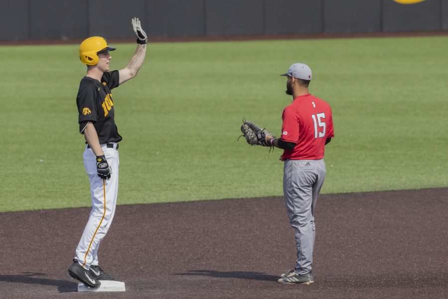 Iowa fielder Connor McCaffery waves to the crowd after hitting a double in the fourth inning of the afternoon Iowa vs Rutgers game at Duane Banks Field on Saturday, April 7, 2019. The Hawkeyes defeated the Scarlet Knights 9-5. 