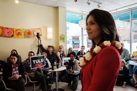 Rep. Tulsi Gabbard, D-Hawaii listens to a question during a meet-and-greet at Yotopia in Iowa City on Tuesday, April 16, 2019. Attendees gathered to listen to Gabbard discuss topics such as defunding regime changing wars, environmental policies, and medicare for all.