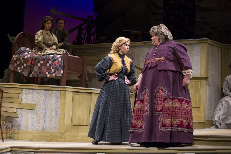 Shelby Tipling (left), playing Meg, and Norah Wolfe, playing Cecilia, perform during a rehearsal for the “Little Women” opera at the Coralville Center for the Performing Arts on Tuesday, April 9, 2019. The opera has showings throughout the weekend of April 12 for audiences to attend. 