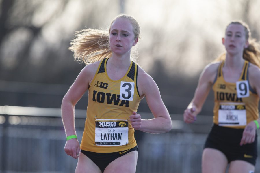 Iowa distance runner Kylie Latham runs the 3000m run at the Musco Twilight Invitational at the Cretzmeyer Track on Saturday, April 13, 2019. Latham finished second with a time of 10:19:44. The Hawkeyes won 10 events during the meet. The Iowa women ranked first with 183 points, and the men ranked fifth 76 points.