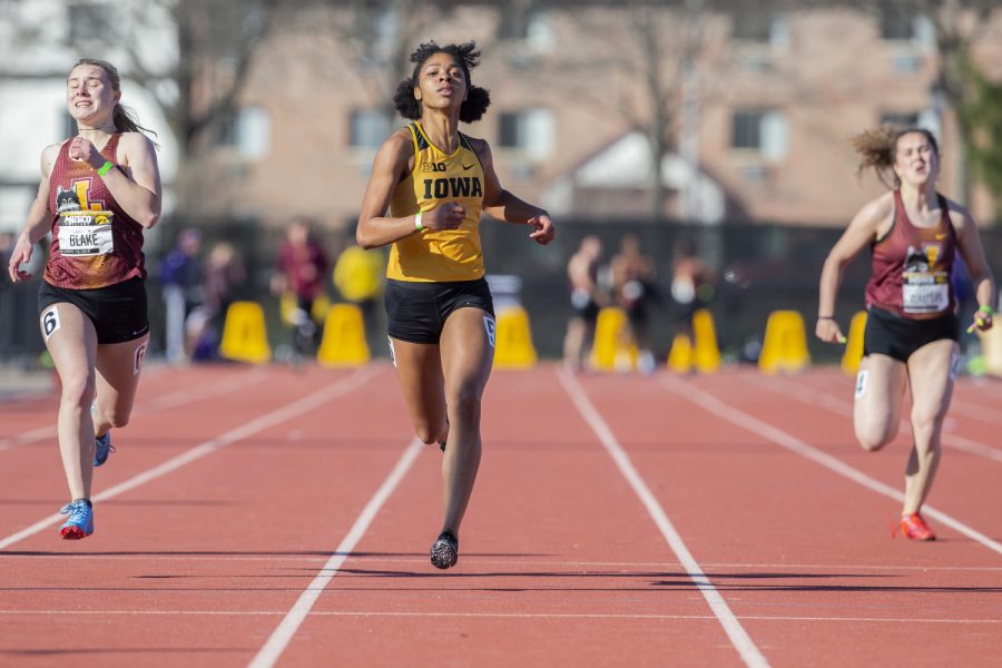 Iowa sprinter Mika Cox comes down the homestretch during the 400m dash at the Musco Twilight Invitational at the Cretzmeyer Track on Saturday, April 13, 2019. Cox finished ninth with a time of 58.95. The Hawkeyes won 10 events during the meet. The Iowa women ranked first with 183 points, and the men ranked fifth 76 points.