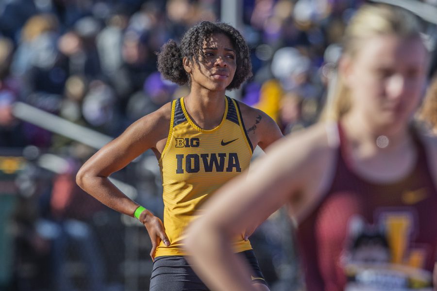 Iowa sprinter Mika Cox stands on the line before the 400m dash at the Musco Twilight Invitational at the Cretzmeyer Track on Saturday, April 13, 2019. Cox finished ninth with a time of 58.95. The Hawkeyes won 10 events during the meet. The Iowa women ranked first with 183 points, and the men ranked fifth 76 points.