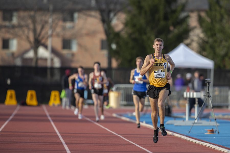 Iowa distance runner Karson Sommer comes down the homestretch during the 3000m run at the Musco Twilight Invitational at the Cretzmeyer Track on Saturday, April 13, 2019. Sommer finished third with a time of 8:37:83. The Hawkeyes won 10 events during the meet. The Iowa women ranked first with 183 points, and the men ranked fifth 76 points.