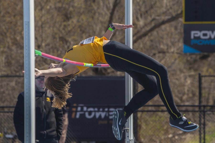 Iowa high jumper Aubrianna Lantrip attempts to clear 1.73m at the Musco Twilight Invitational at the Cretzmeyer Track on Saturday, April 13, 2019. Lantrip placed third in the event with a height of 1.70m. The Hawkeyes won 10 events during the meet. The Iowa women ranked first with 183 points, and the men ranked fifth 76 points.