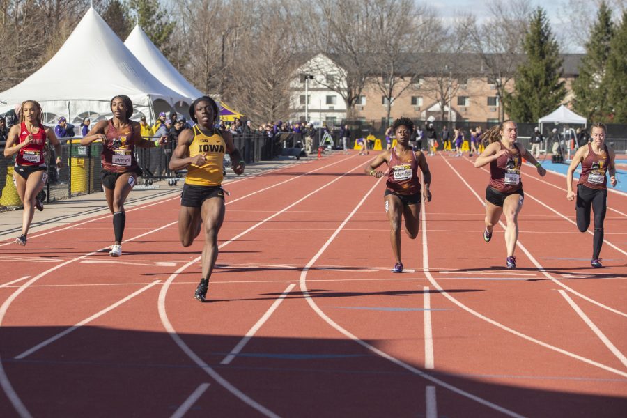 Antonise Christian crosses the line for the 100m dash at the Musco Twilight Invitational at the Cretzmeyer Track on Saturday, April 13, 2019. Christian finished first with a time of 11.97. The Hawkeyes won 10 events during the meet. The Iowa women ranked first with 183 points, and the men ranked fifth 76 points.