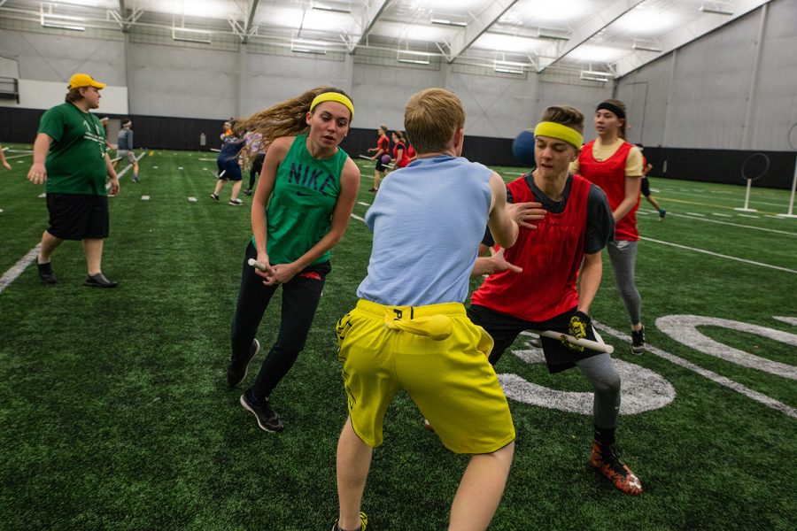 University of Iowa Club Quidditch players chase the golden snitch during an intersquad scrimmage at the Hawkeye Tennis and Recreation Complex on Wednesday, November 14, 2018. 