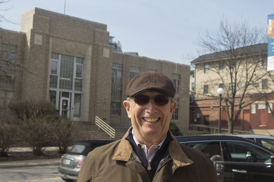 Richard Stout, the nephew of George Stout, stands outside of the old Press-Citizen building on April 6, 2019.