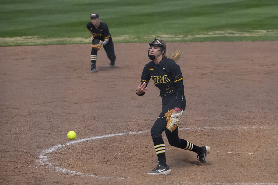 Iowa pitcher Allison Doocy throws out a pitch during the first game in a double header against Illinois on Saturday, April 13, 2019. The Hawkeyes fell to the Illinis 12-11 but came back to win the second game. 