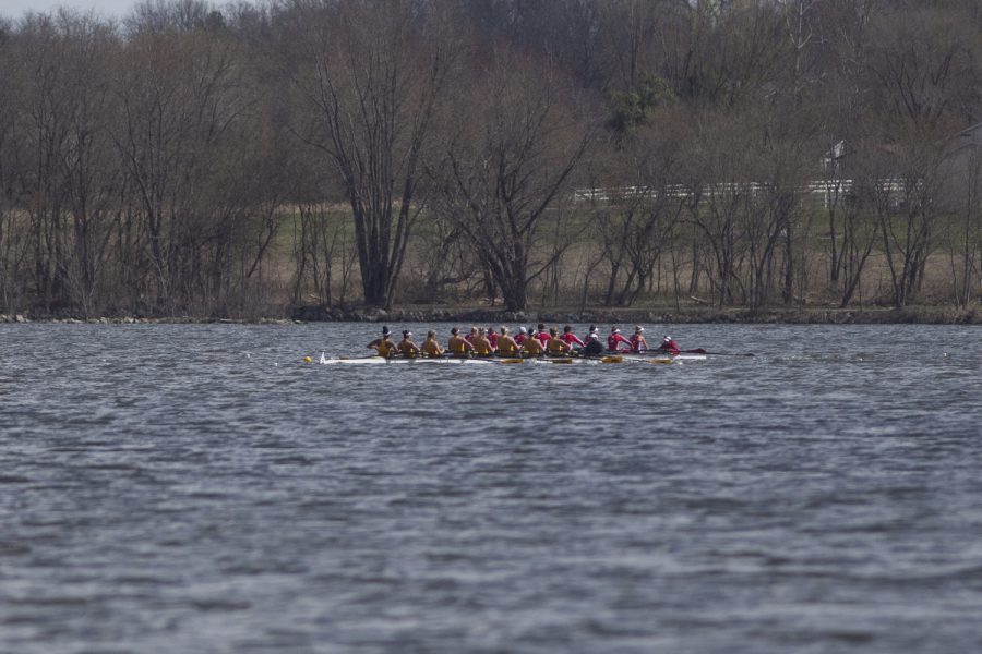 Iowas+varsity+8+crew+passes+Wisconsin+the+first+session+of+a+womens+rowing+meet+on+Lake+MacBride+on+Saturday+April+13%2C+2019.+They+won+the+race+by+7.49+seconds+Iowa+won+3+out+of+12+races+with+the+varsity+8+crew+winning+both+races+for+the+day.