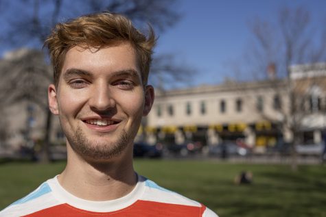 University of Iowa student Mark Schoen stands outside of Schaefer Hall for a portrait on Monday, April 8, 2019.