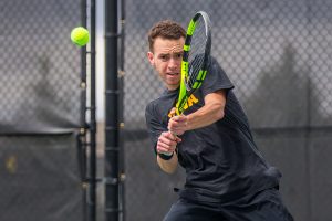 Iowas Kareem Allaf hits a backhand during a mens tennis match between Iowa and Ohio State at the HTRC on Sunday, April 7, 2019. The Buckeyes defeated the Hawkeyes, 4-1. 