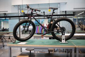 A hand made bike is seen during the Nexus Open House at the Seamans Center in Iowa City on Wednesday, April 24, 2019. During the event, students presented projects that combined art and engineering. 