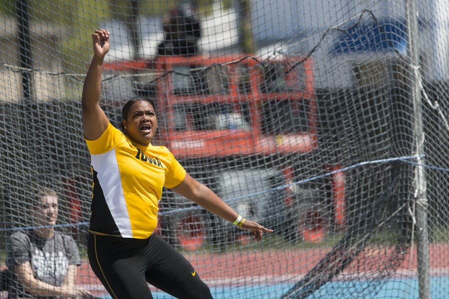 Iowa's Laulauga Tausaga watches her throw during the 18th annual Musco Twilight at Francis X. Cretzmeyer Track on Saturday, April 22, 2017. Iowa's men and women's track and field finished first overall in the Musco Twilight with a 237.5 and 203 respectively.