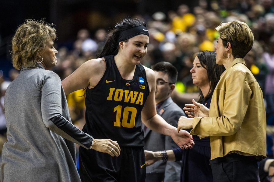 Iowa+center+Megan+Gustafson+is+cheered+on+as+she+is+taken+out+of+her+final+game+during+the+NCAA+Elite+8+game+against+Baylor+at+the+Greensboro+Coliseum+Complex+on+Monday%2C+April+1%2C+2019.+The+Bears+defeated+the+Hawkeyes+85-53.